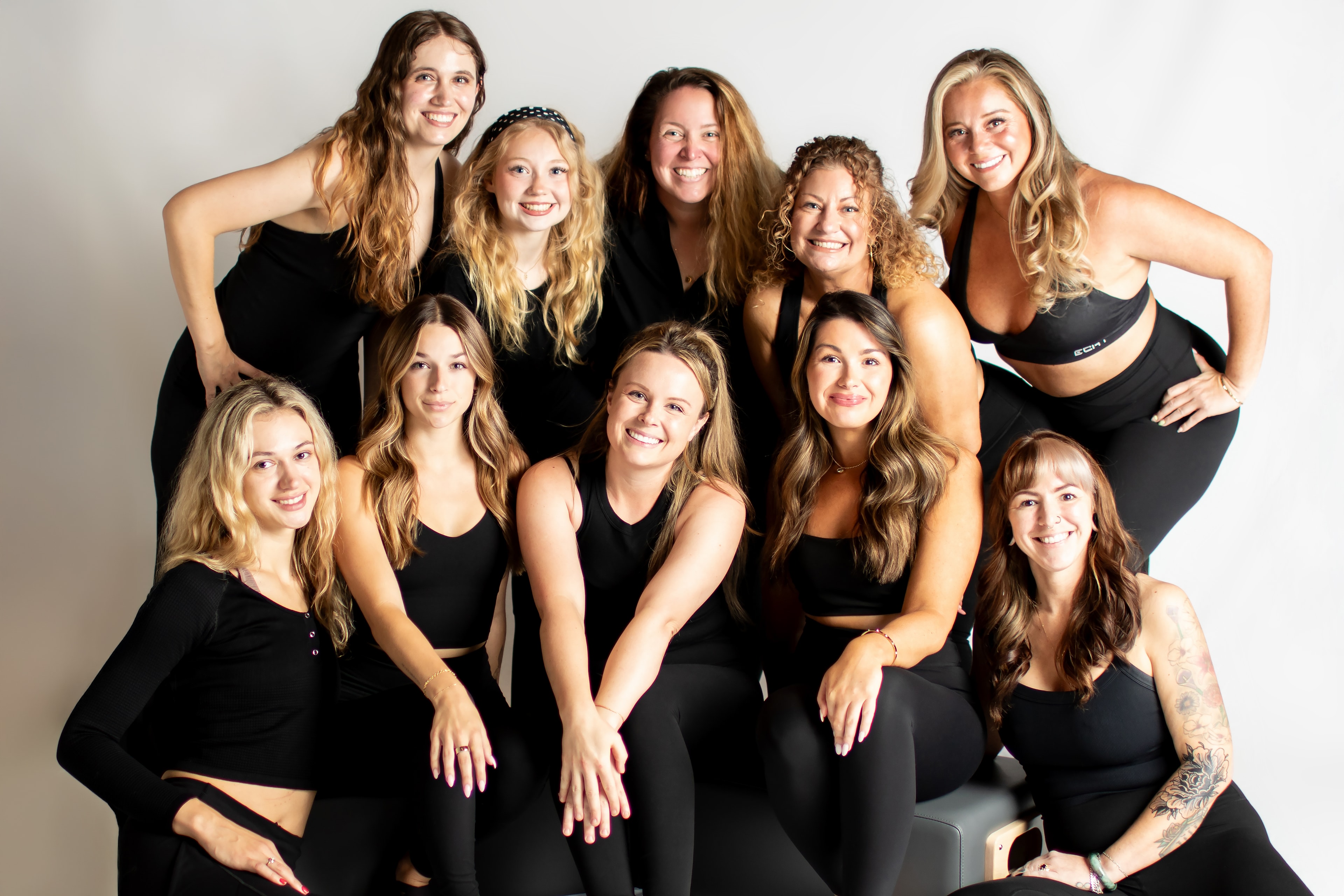 The Remedy Room Pilates instructor team together in the studio